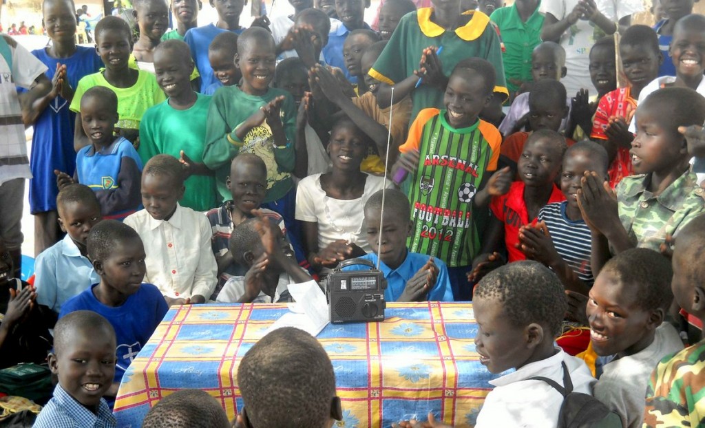 This photo was taken in South Sudan, after Ears To Our World distributed radios in this rural community for the fourth year running. This photo was taken prior to the outbreak of violence the country is currently enduring.  Can you imagine the power of information each radio can provide to its community?