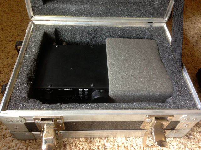 A flight case I purchased for $3 at a charity store holds the CR-1, the Sony ICF-SW7600GR and the Tecsun PL-380. The case is pretty much bullet proof and protects its contents even if dropped or heavy items placed on top.