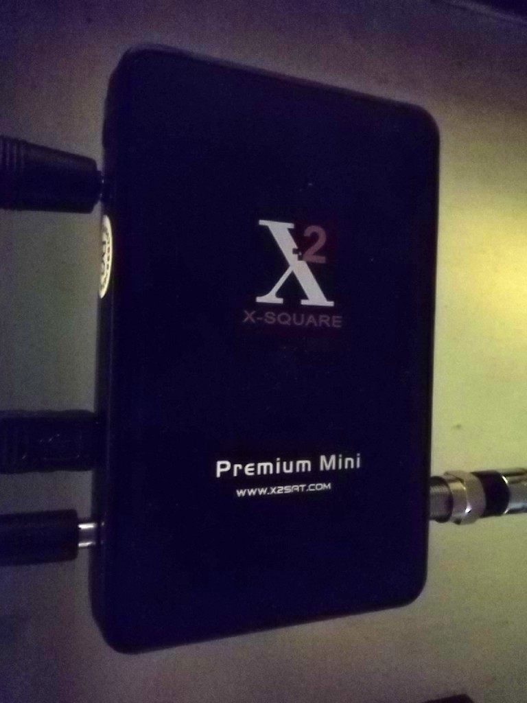 X-Square FTA receiver, about the size of a cigarette pack.
