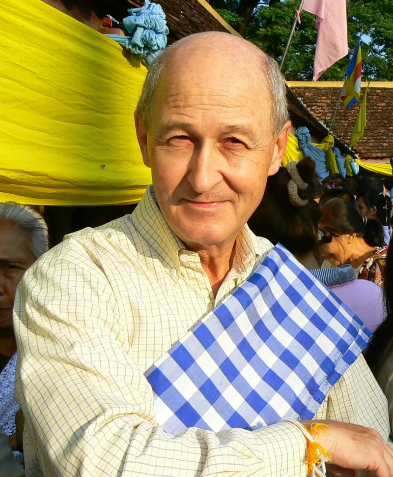 Old Balinese Farmer With Wrinkled Face In Traditional Straw Hat